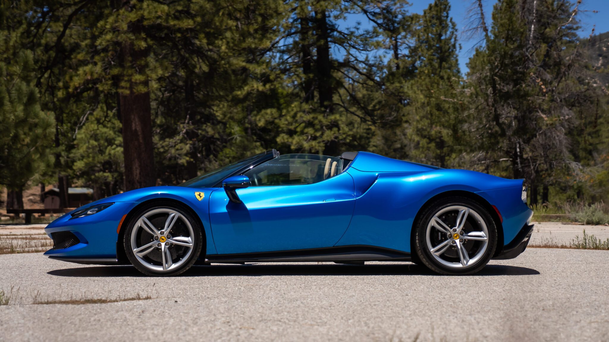 An image of a Ferrari 296 GTS parked outdoors.