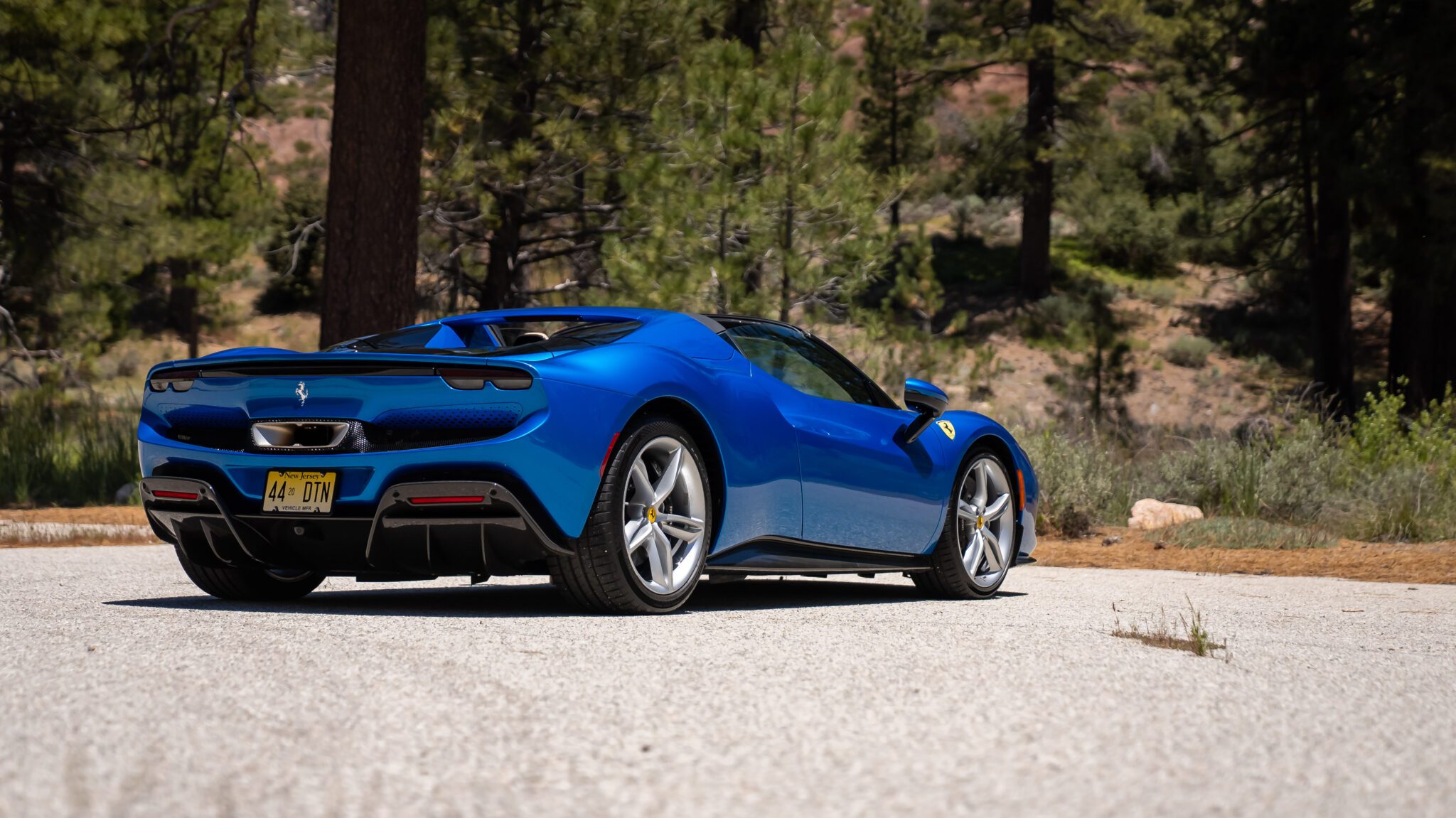 An image of a Ferrari 296 GTS parked outdoors.