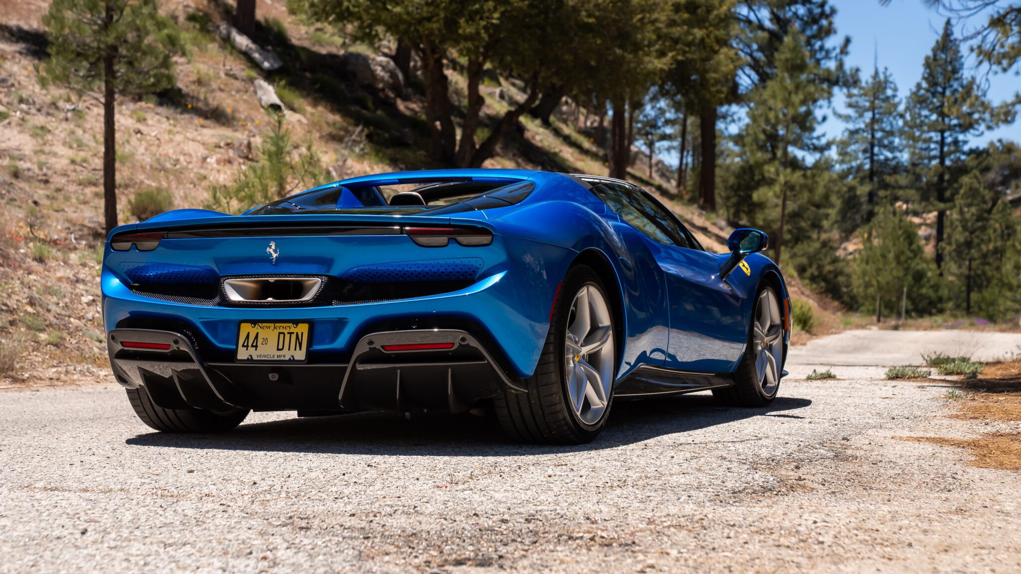 An image of a Ferrari 296 GTS parked outdoors.