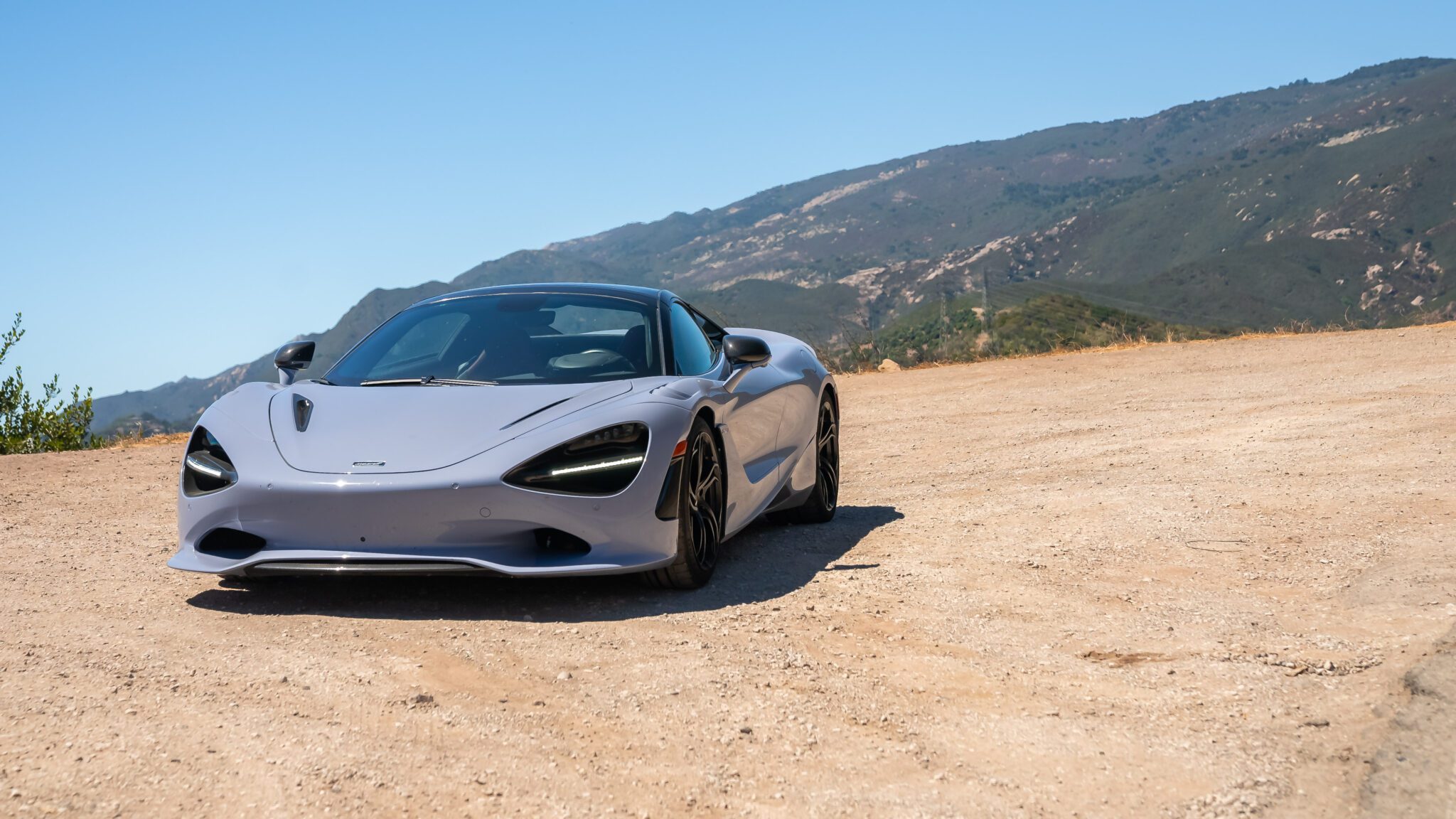 An image of a McLaren 750S Spider parked outdoors.