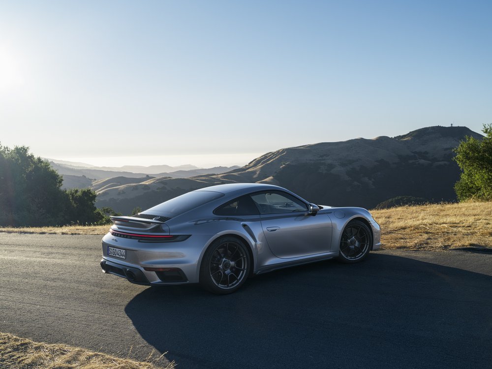 An image of a Porsche 911 Turbo parked outdoors.