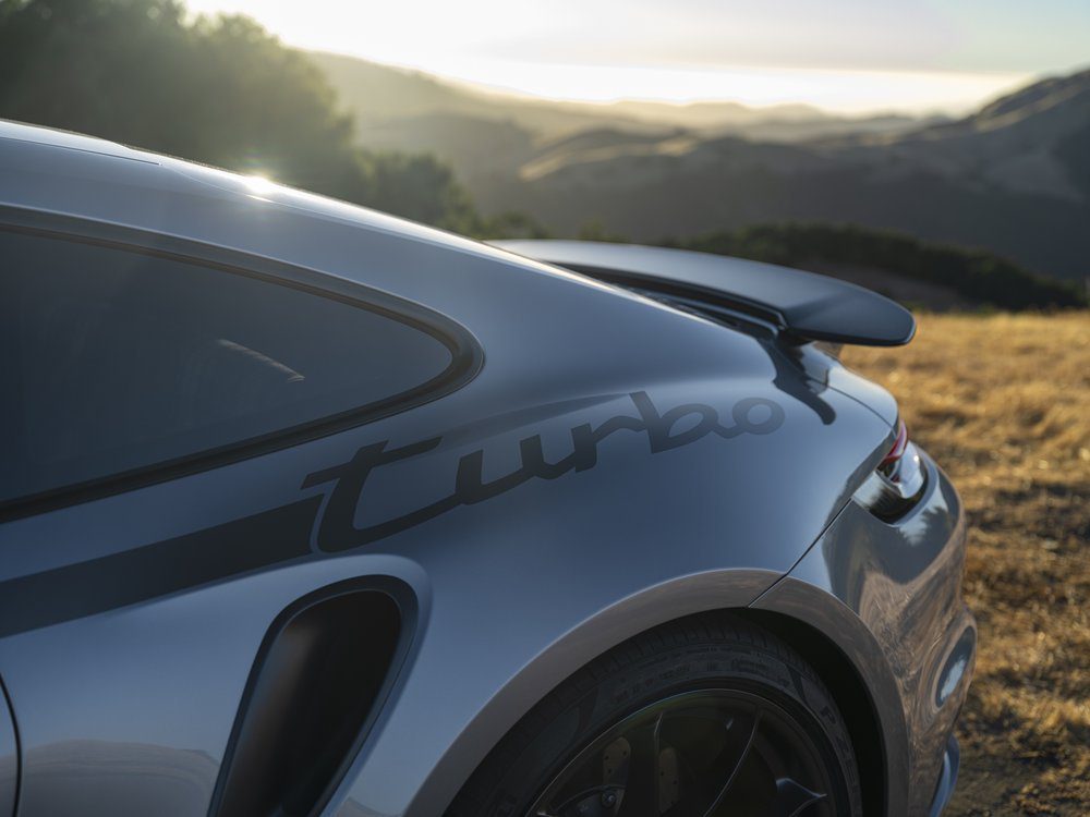 An image of a Porsche 911 Turbo parked outdoors.