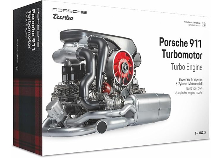 Box of a Porsche 911 Turbo Engine Model Kit, menangkap hasrat untuk presisi dengan gambar yang menampilkan kipas merah ikon mesin.