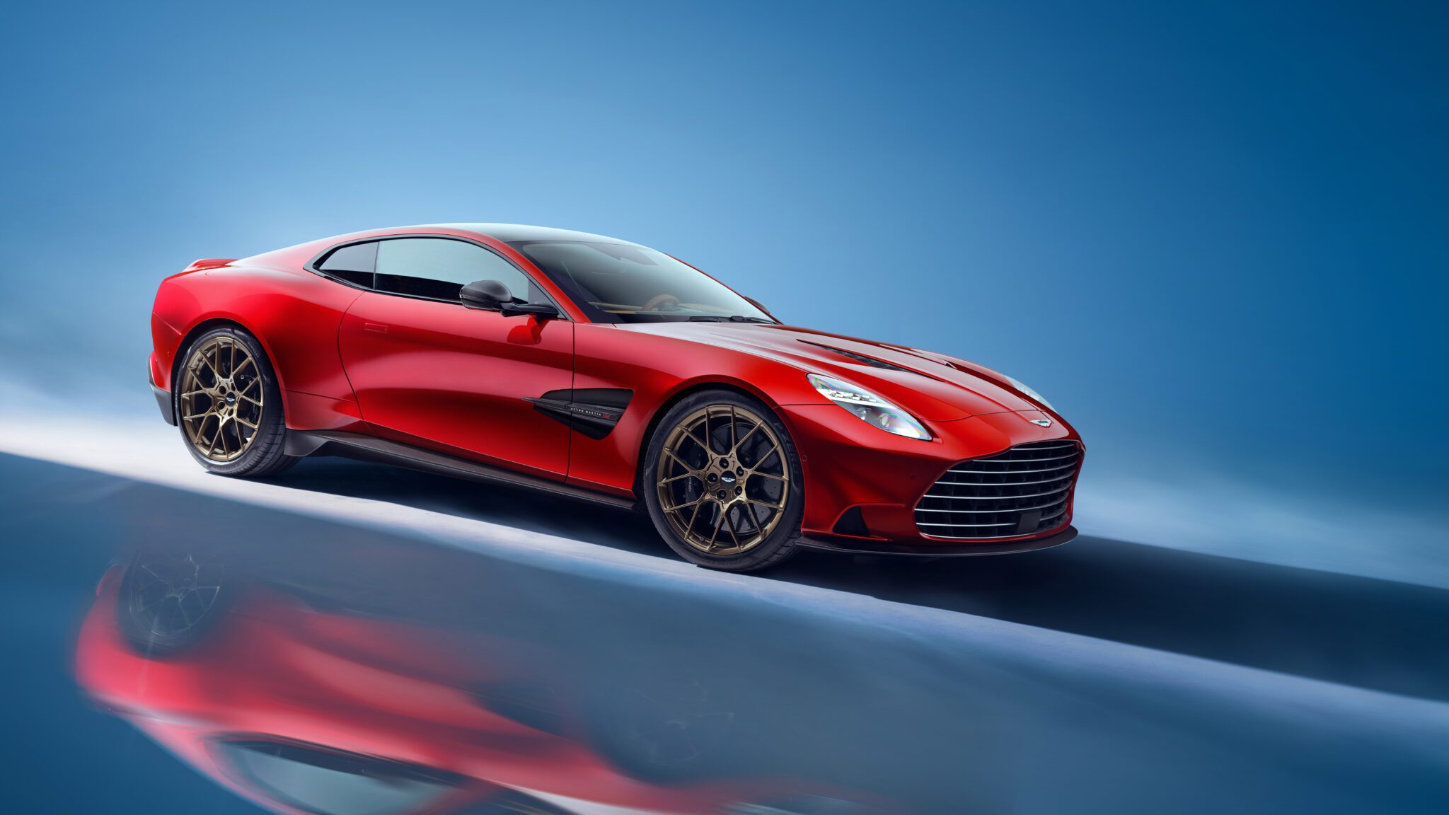 An image of an Aston Martin Vanquish parked in a studio.