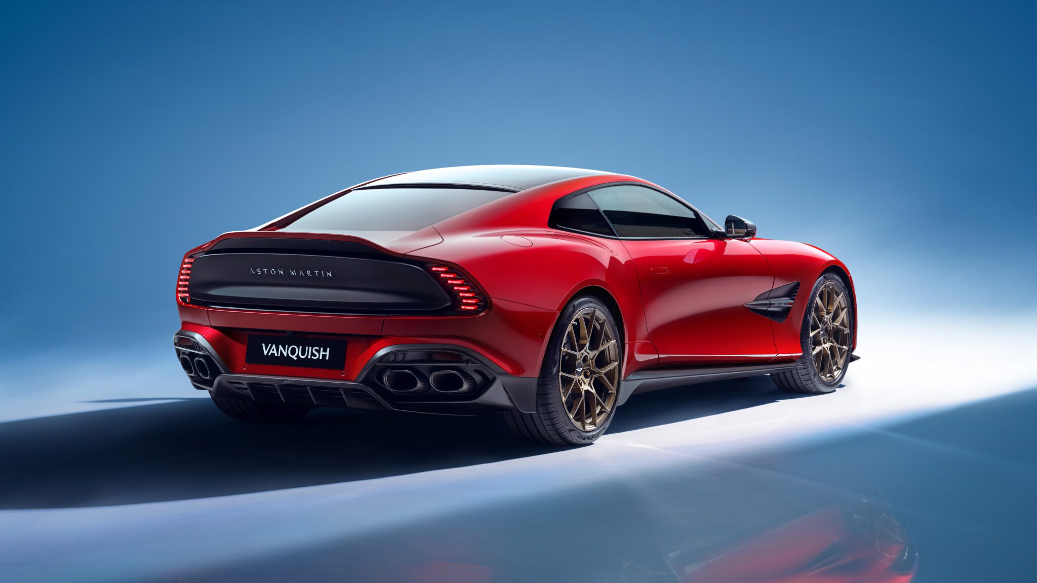 An image of an Aston Martin Vanquish parked in a studio.