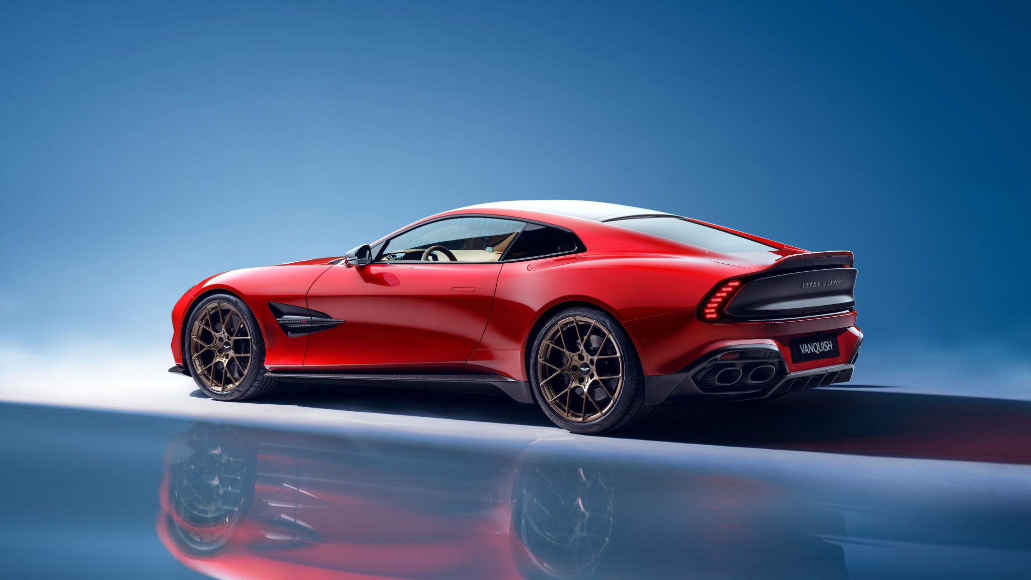 An image of an Aston Martin Vanquish parked in a studio.