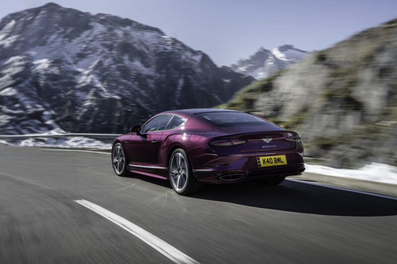 An image of a Bentley Continental GT Speed on a mountain road.