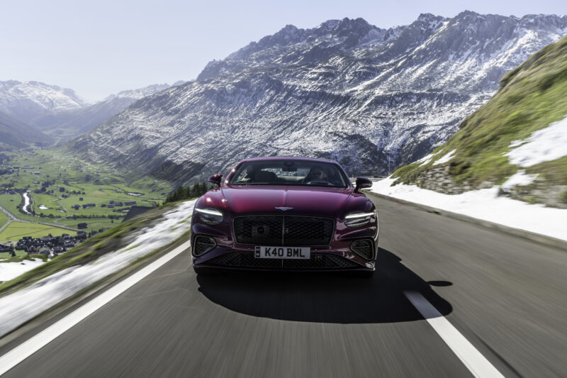 An image of a Bentley Continental GT Speed on a mountain road.