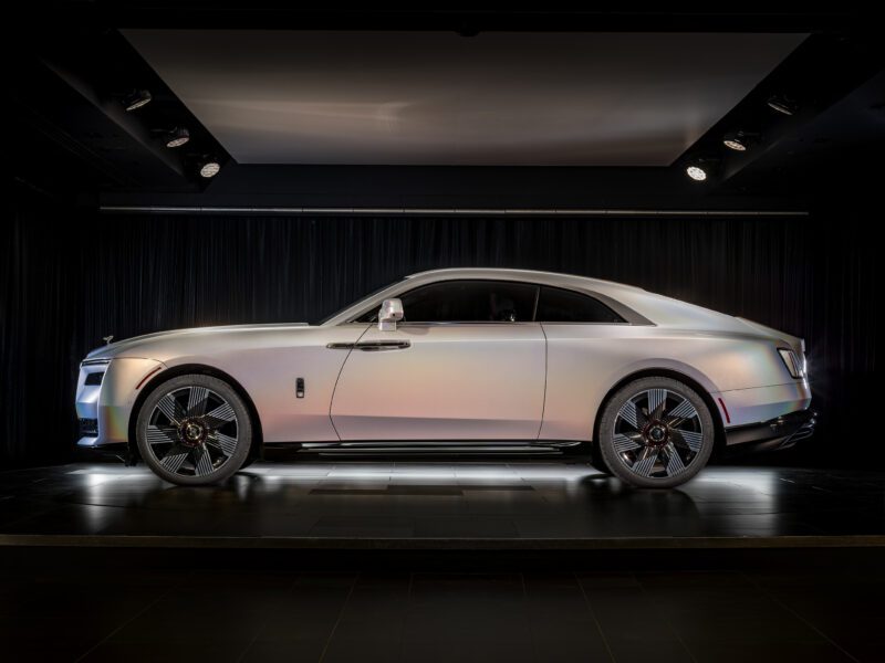 An image of a Rolls-Royce Spectre Lunaflair parked outdoors.