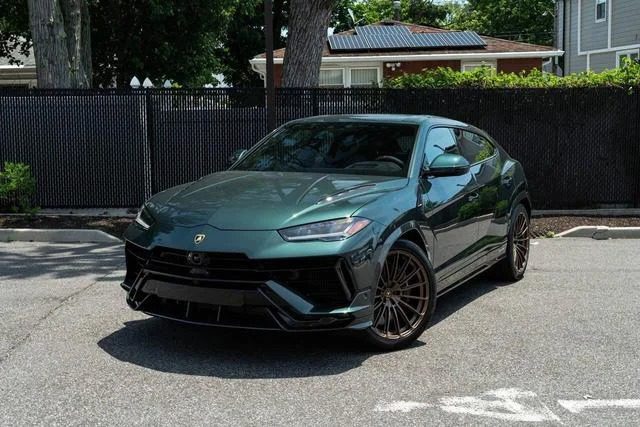 A dark green Ferrari Purosangue, an Italian super SUV, is parked in a sunny outdoor setting with a fence and trees in the background.