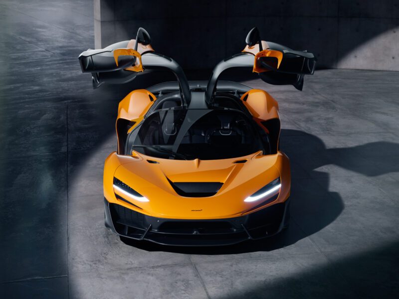 A digital image of a McLaren W1 parked in a studio.