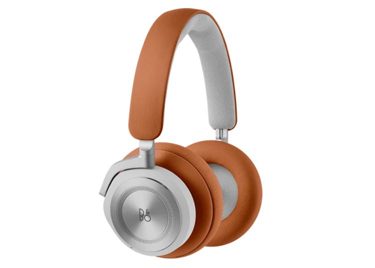 These brown and silver over-ear headphones feature a sleek design, perfect for the cooler months. Ideal for those who appreciate style and functionality, they make a standout addition to your Fall Shopping Guide, offering premium sound with flair akin to duPont REGISTRY's finest recommendations.