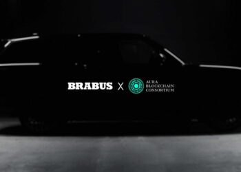 Silhouette of a black car with the logos "BRABUS" and "Aura Blockchain Consortium" on a dark background, embodying the essence of Masterpiece Supercars.