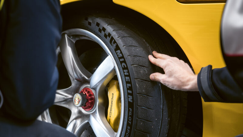 A close up image of a car's tire.