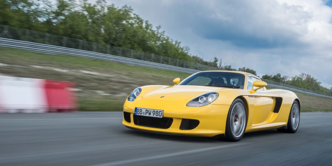 An image of a Porsche Carrera GT on a track.