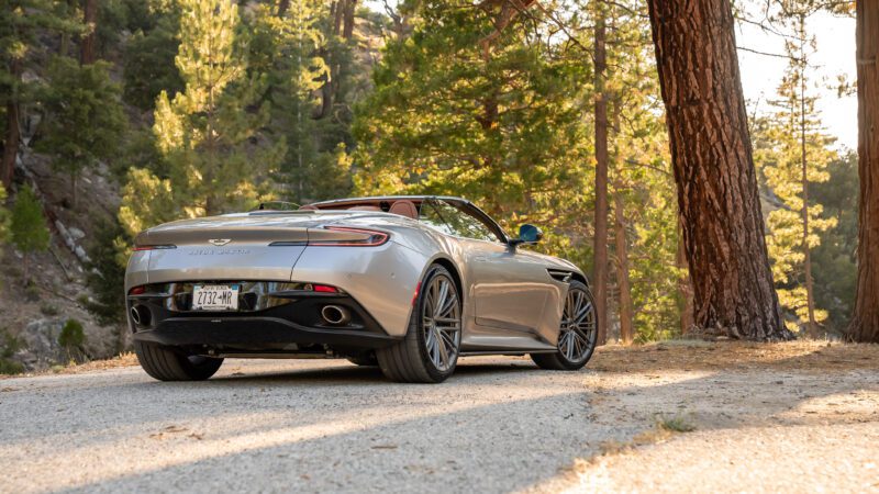 An image of an Aston Martin DB12 Volante parked outdoors.