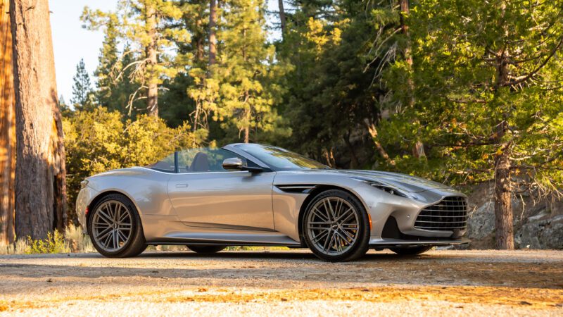 An image of an Aston Martin DB12 Volante parked outdoors.