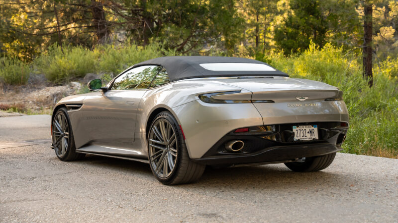 An image of an Aston Martin DB12 Volante parked outdoors.