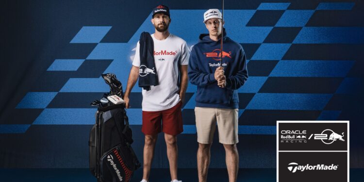 Two men in golf attire stand beside a golf bag adorned with the Pursuit Golf Collection. They wear TaylorMade branding and pose confidently in front of an Oracle Red Bull Racing backdrop, where a sign reads "Team Licensee.