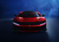 A red Ferrari hypercar with a powerful V6 engine is viewed from the front on a dark, misty background.