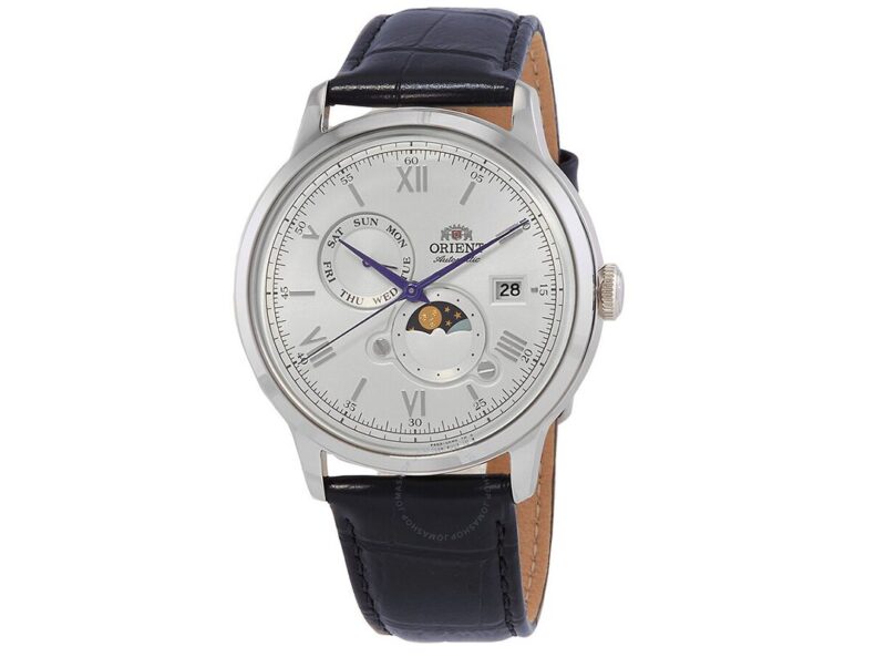 Discover the elegance of this Orient wristwatch with a leather strap, featuring a silver dial adorned with Roman numerals. Perfect for any watch collection, it includes a date window, day-night indicator, and two sub-dials for days and months—all accessible in watches under $500.