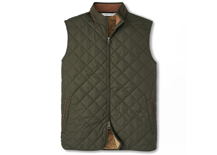 A green quilted vest with a front zipper and two brown-trimmed pockets, perfect for the cooler months. Ideal for any Fall Shopping Guide, its interior is lined in lighter brown fabric for added warmth and style.