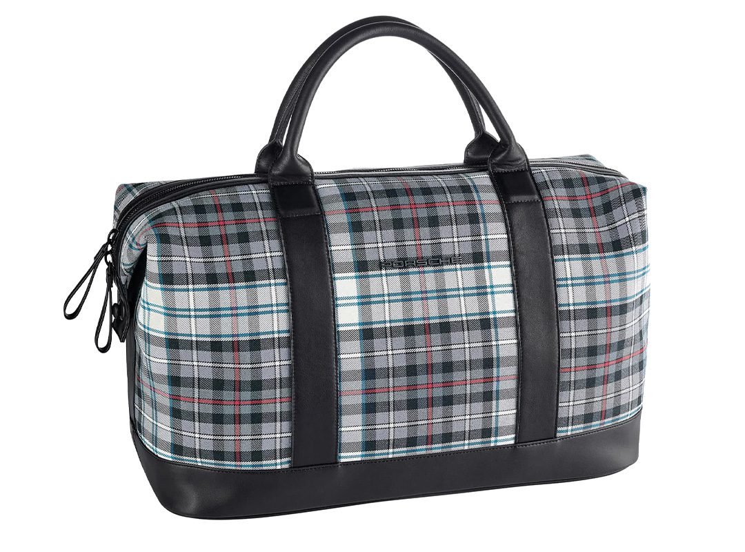 This stylish travel bag features a sleek gray and black checkered pattern with black leather handles and base, perfect for your next road trip.