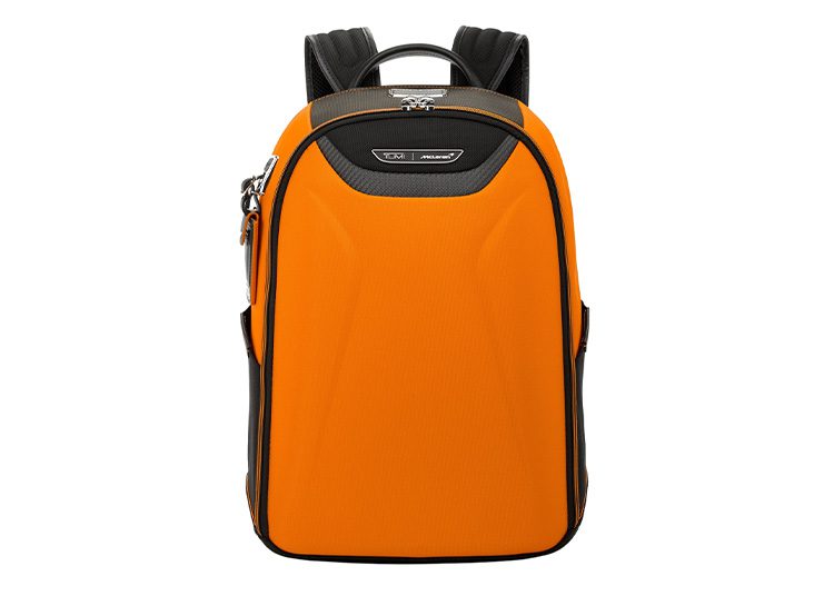 Perfect for cooler months, this orange and black backpack features padded shoulder straps, a front pocket, and a top handle. Ideal for your fall shopping guide adventures or as recommended by the duPont REGISTRY.