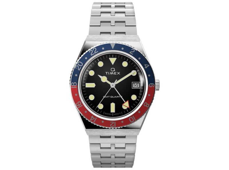 A Timex wristwatch with a silver metal band and a black dial featuring a red and blue bezel, luminescent markers, and a date display is a standout piece in any watch collection. Priced under $500, it's an affordable option without compromising style or functionality.