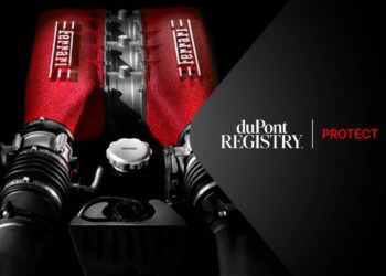 Image of a Ferrari engine with red covers and duPont Registry logo on the right, alongside the word "Protect." Perfect for enthusiasts of luxury cars, this is a testament to performance and style.