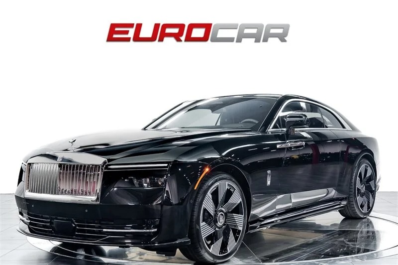 A black Electric Super Coupe, embodying Ultra-Luxe design, is parked on a glossy floor with the "EUROCAR" logo in red and gray above it.