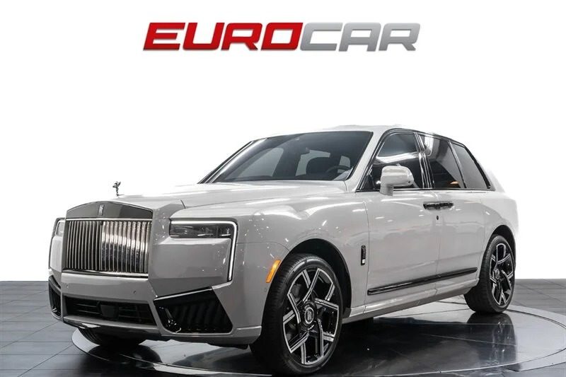 A white Ultra-Luxe SUV is displayed in a showroom with "EUROCAR" written above it, exuding the elegance of a Rolls-Royce Cullinan.