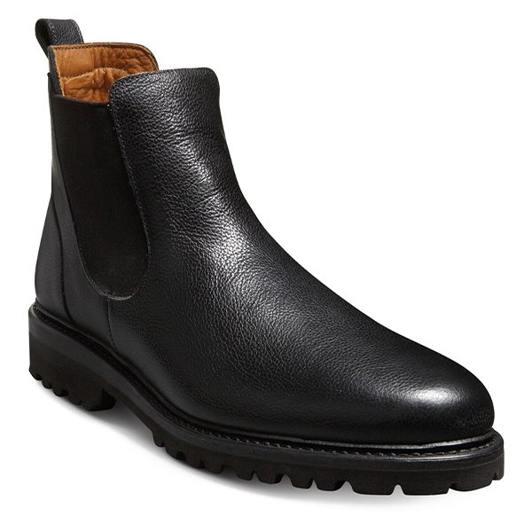 Displayed against a white background, this Black Friday 2024 special features a black leather Chelsea boot with elastic side panels and a rugged sole. Dive into duPont REGISTRY to explore the biggest savings on this timeless footwear classic.