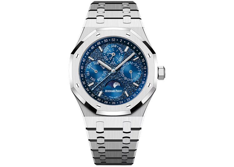 Discover the 2024 luxury watch featured in the duPont REGISTRY. Elegantly crafted, it boasts a silver metal band and a striking blue face that beautifully displays the date, moon phase, and multiple dials, making it an essential addition to any Luxury Watch Guide.