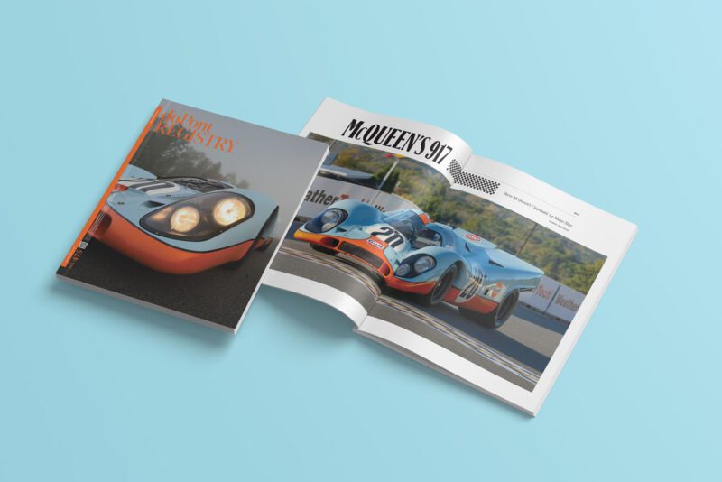 Two magazines are displayed on a light blue surface—one closed, showcasing a racing car, perfect for the discerning reader's December 2024 wish list. The other is open to reveal "McQueen's 917" roaring down the track, offering a taste of duPont REGISTRY's ultimate gift guide.