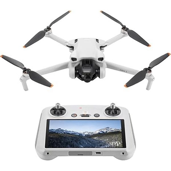 A white drone with four propellers is showcased above a remote controller, its screen displaying a landscape image. Discover this sleek gadget in the duPont REGISTRY; it's part of the Black Friday 2024 lineup, offering some of the biggest savings of the year.