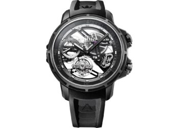 A black and silver wristwatch, considered one of the best luxury watches, features an intricate, transparent mechanical design paired with a comfortable rubber strap.