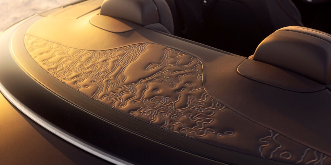 Close-up of a Bentley's interior, showcasing intricate leather detailing on the dashboard from the Bespoke Collection, with ambient lighting highlighting the texture.