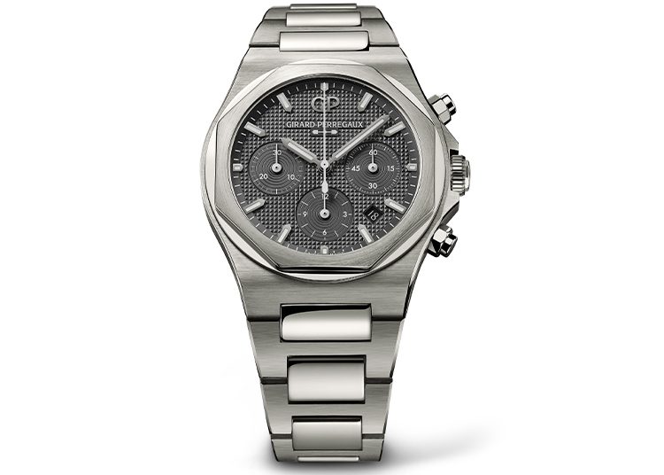 Discover the 2024 luxury stainless steel chronograph watch featured in the duPont REGISTRY, boasting a hexagonal bezel, textured black dial, and three subdials—a timeless piece for any collection.