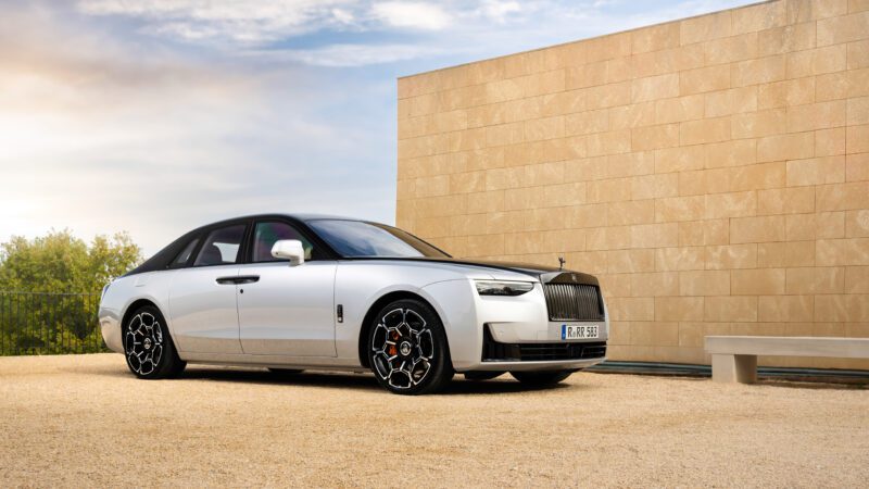 An image of a silver Rolls-Royce Ghost Series II parked outdoors.