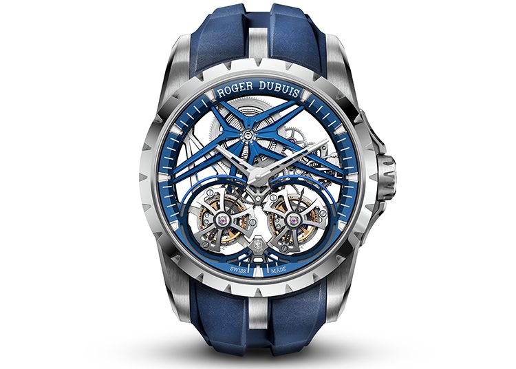 The 2024 luxury watch guide showcases a refined Roger Dubuis timepiece, highlighting its intricate skeletal design with blue accents and visible gears. This masterpiece, echoed in duPont REGISTRY's pages, features the iconic branding and a matching blue strap.