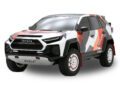 The 2024 SEMA highlights include a rugged SUV with a bold geometric paint design, featuring large tires and the iconic Toyota emblem on the front grille—perfect for those inspired by Adventure Concepts.