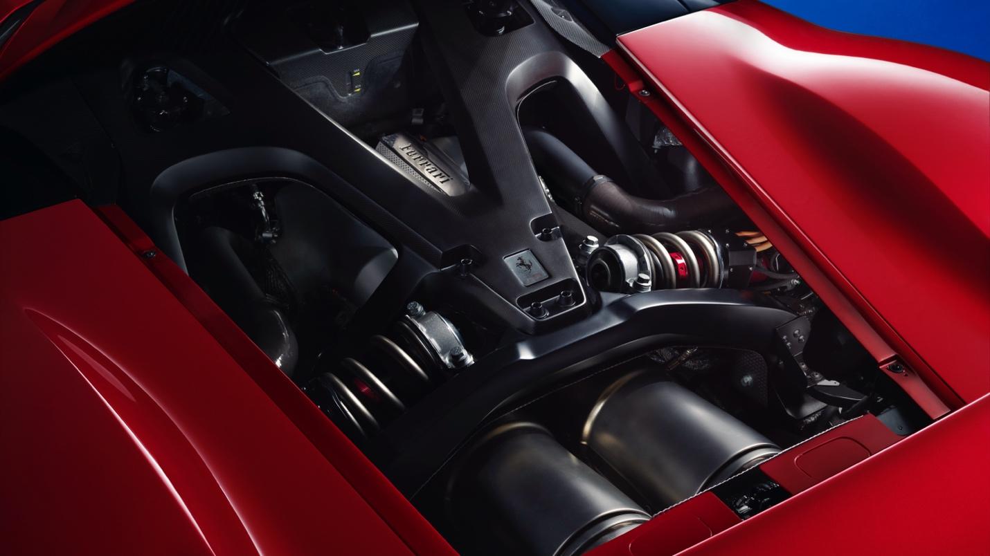 Close-up view of a high-performance Ferrari F80 engine with red exterior, expertly designed to silence shortsighted criticism.