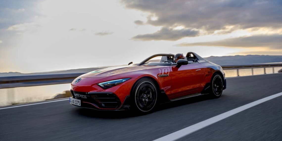 A Mercedes-AMG convertible sports car, its sleek lines glistening in the golden hues of sunset, PureSpeed truly revealed as it races along the open highway.