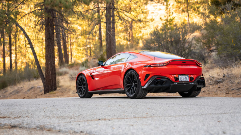 An image of an orange 2025 Aston Martin Vantage parked outdoors.