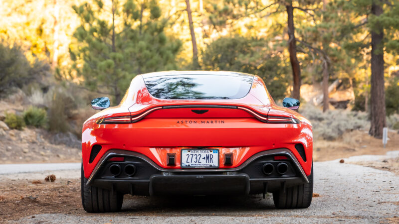 An image of an orange 2025 Aston Martin Vantage parked outdoors.