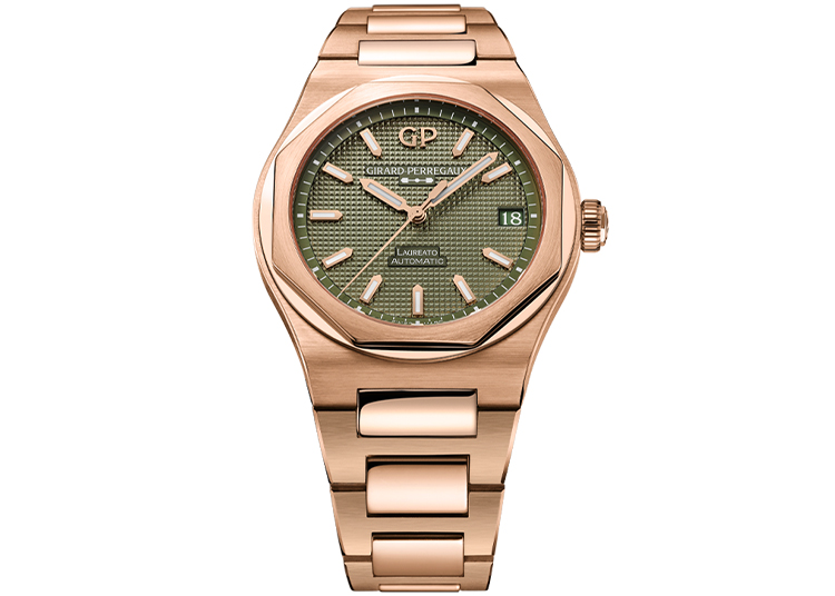 Discover the 2024 Holiday Gift Guide's standout: a rose gold wristwatch with a green textured dial, baton markers, and a date display at 3 o'clock. The bracelet features polished and brushed links, making it an exceptional choice from duPont REGISTRY’s curated selection.