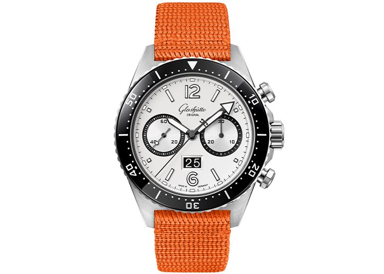 Featured in the 2024 Holiday Gift Guide and duPont REGISTRY, this stylish watch boasts an orange fabric strap, a white dial, two sub-dials, and a date display at 6 o'clock—making it the perfect blend of functionality and trendiness.