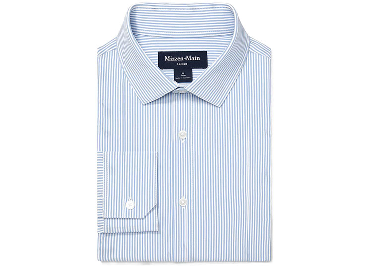 Folded blue and white striped dress shirt with a button-down collar and front buttons, perfect for gentlemen seeking refined luxury gifts.