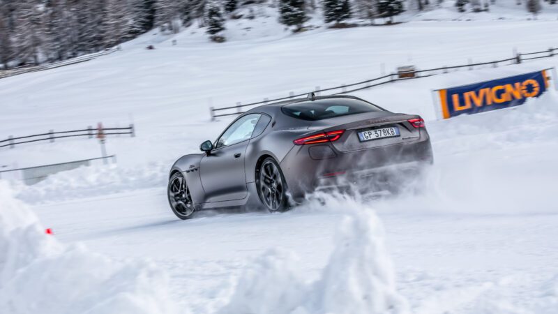 An image of a Maserati GranTurismo Folgore driving on an ice track.